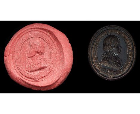 *An Unmounted Portrait Intaglio Seal of Nelson with motto, c. 1805-15, in purple-coloured glass, with a uniformed bust of Nel