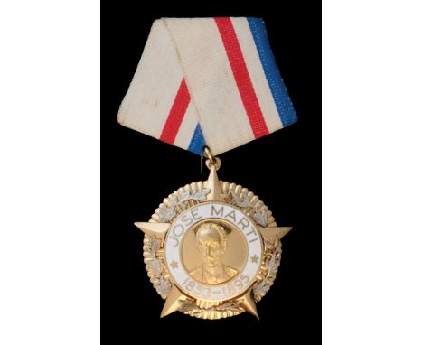 *Cuba, Order of Jose Marti, post 1979, breast badge, in silver gilt and white enamel, 43.5mm, in plastic case of issue, with 