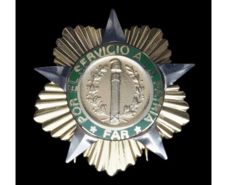 *Cuba, Order of Service to the Country and Revolutionary Forces, First class breast badge, in silver-gilt and green enamel, i