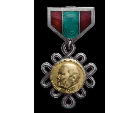 *Mongolia, Choibalsan Prize, in silver, with gold portrait and enamelled ribbon, with screwback suspension, reverse, stained,