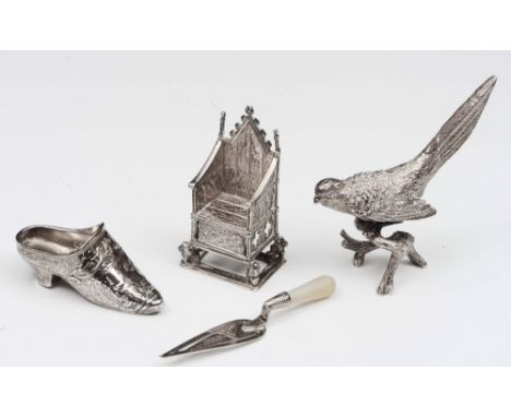 A silver model of the Coronation chair with relief and pierced decoration, London 1902, together with a Continental 930 white