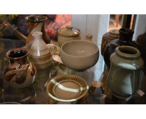 A Kenneth Quick condiment bottle and small dish, each impressed potter's seal, the bottle 10cm high, a Sidney Tustin preserve