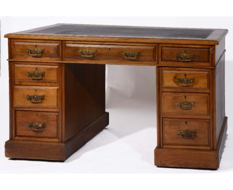 A 19th Century walnut pedestal desk having inset leather top and three drawers to front over three drawers on each pedestal, 