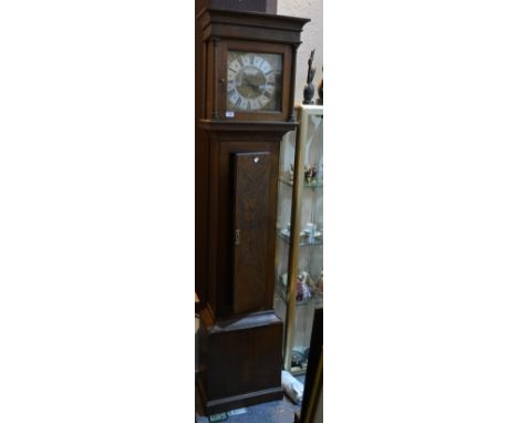 Phillip Avenell of Farnham An oak longcase clock with brass and silvered dial with date aperture, 198cm high