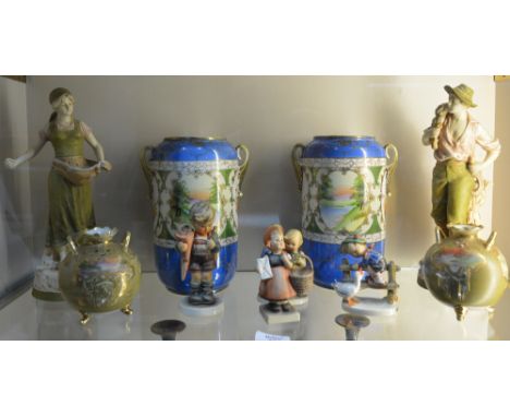 A pair of Royal Dux porcelain figures two pairs of Noritake figures and four Hummel figures