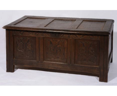 An 18th Century oak coffer with carved panel front, 132cm