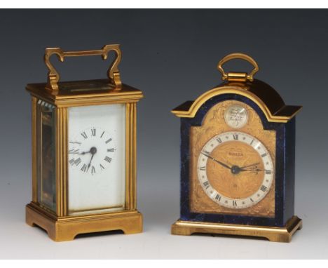 A miniature brass carriage timepiece and a miniature Swiza mantel clock (2)
