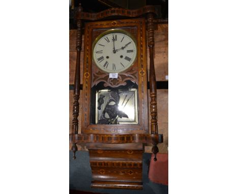 An American inlaid wall clock with striking movement, 76cm high