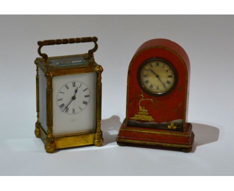 A brass carriage clock with loop handle, enamel dial and fluted pilasters, together with a red lacquered clock with chinoiser