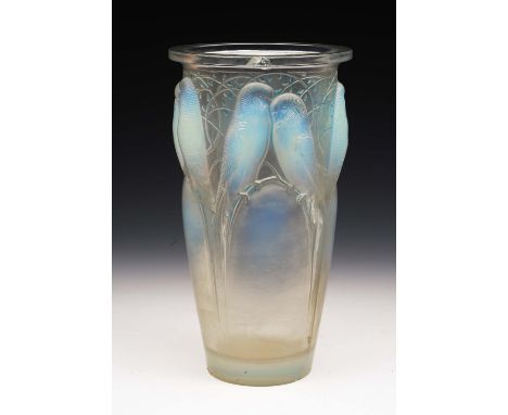 A Rene Lalique Ceylan opalescent glass vase model number 905 from 1924, decorated with pairs of budgerigars on foliage moulde