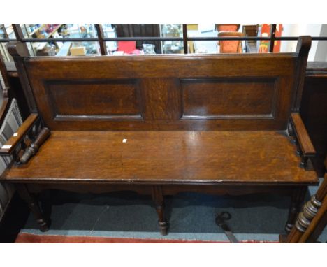 A 19th Century oak window/hall seat with panel back, 140cm across