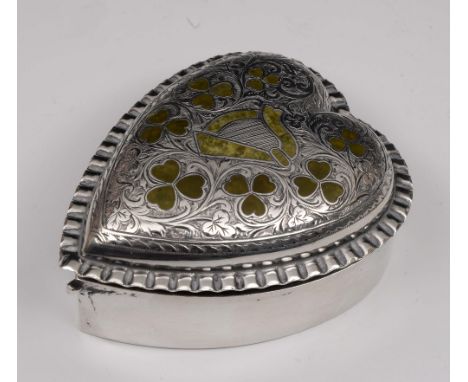A silver heart-shaped trinket box with rising lid and inlaid hardstone decoration in the form of clover and a harp, with crim