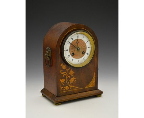 An Edwardian mahogany and inlaid mantel clock with striking mechanism