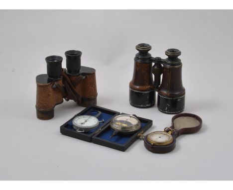 Gilt metal cased pocket compass, silvered dial, diameter 5cm in a morocco case, vault meter, micrometer, two pairs of binocul