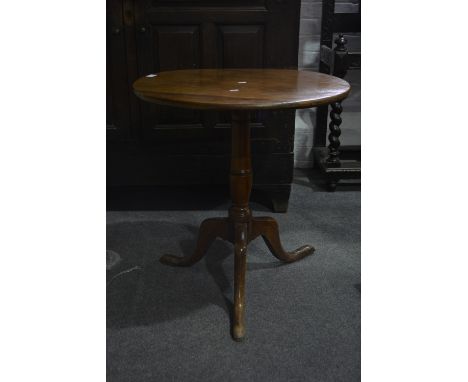 Mahogany pedestal table, circular tilt top, baluster column, tripod legs, diameter 66cm.