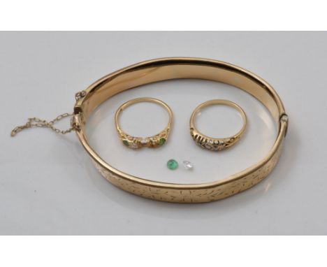 Five stone diamond ring,  old cut stones, gypsy set, emerald and white stone ring and a gold plated bangle (3).