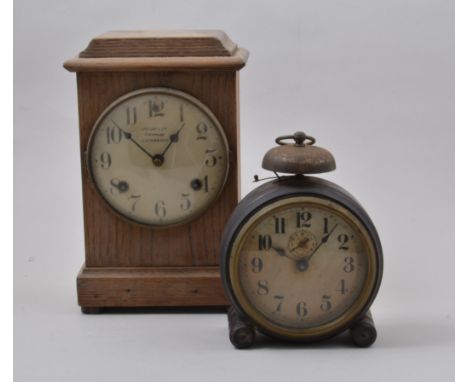 American oak cased mantel clock, dial signed Judge & Co., Cheapside, Leicester, 49cm, an old alarm clock, gilt metal gothic s