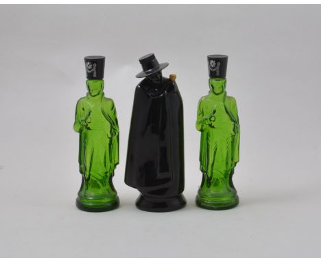 Wade Sandeman flask, 21cm, and two Italian green glass flasks, modelled as guardsmen, (3).