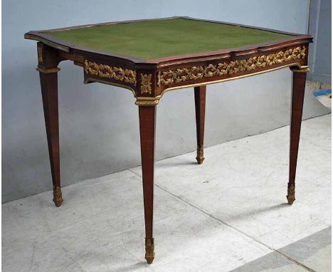 A 19th century French Style mahogany crossbanded and line inlaid ormolu mounted Fold Over Top Games Table with metamorphic sl