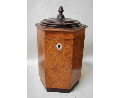 A burr walnut Caddy of hexagonal form, the hinged lid with rosewood top surmounted with a turned finial, on rosewood foot, mo