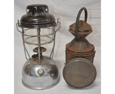 Vintage LNER railwayman's 3 colour signal lamp (damage to clear and red glass) and a Tilley storm lamp 