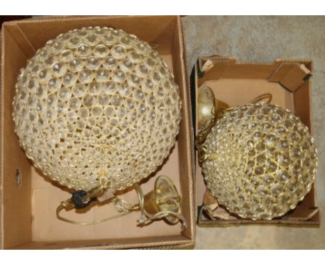 Graduated pair of gilt metal and glass globular hanging light fittings, approx 40cm max (2) 