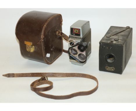 Bell and Howell 8mm cine camera autoset turret, complete with original leather case, and a Coronet box camera in black leathe