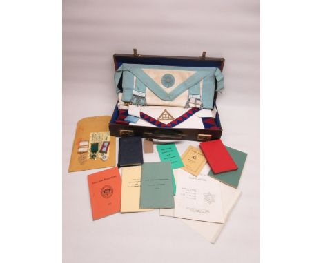 Collection of Zambia Mason chapter aprons, sash, books, paperwork, Mason chapter medal and 2 other medals with case (qty) 