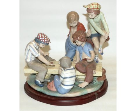Large Nao porcelain figure group, boys playing cards, H30cm, with wooden plinth 