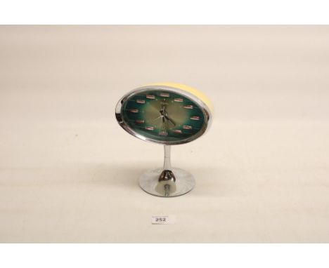Rhythm 1970s pedestal cream and chrome plated alarm clock No: A-N0 51141, H19.5cm (alarm currently working) 