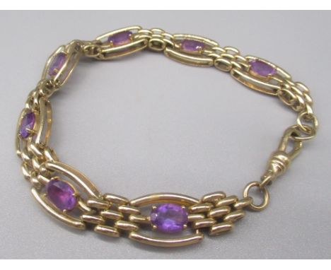 9ct yellow gold three bar gate bracelet set with seven amethyst coloured stones, with dog clip clasp, stamped 375, 14.1g 