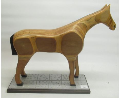 Hand crafted wooden laminated standing horse on plinth H46.5cm, an elm quartz wall clock of sporting interest, hour markers s