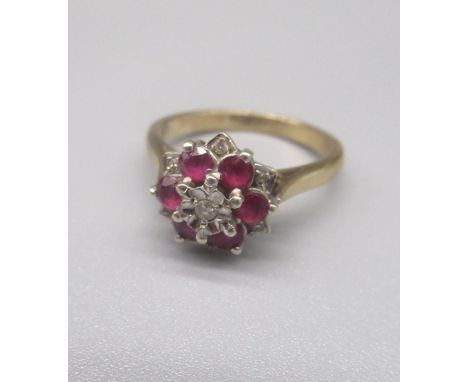 9ct yellow gold diamond and ruby cluster ring, stamped 375, size M,  3.0g 