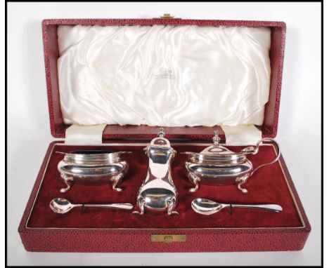 A vintage 20th Century Walker and Hall silver plated condiment cruet set complete in original box consisting of lidded mustar