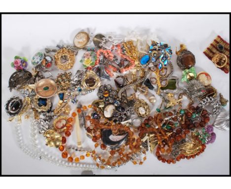 A collection of vintage costume jewelry to include bracelets, rings, earrings, brooches, necklaces, cufflinks etc. Included i