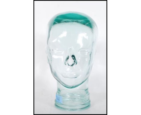 A vintage retro 20th century shop display / millinery mannequin head of pressed glass construction with moulded features. Bea