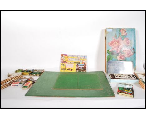 A charming collection of original vintage Britains made ' Floral Miniature Garden ' items and accessories. Highly detailed, t