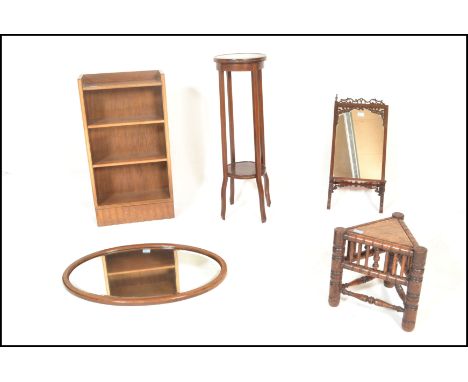 An Edwardian mahogany plant stand torchere with circular tier together with on oak turners stool of triangular form together 