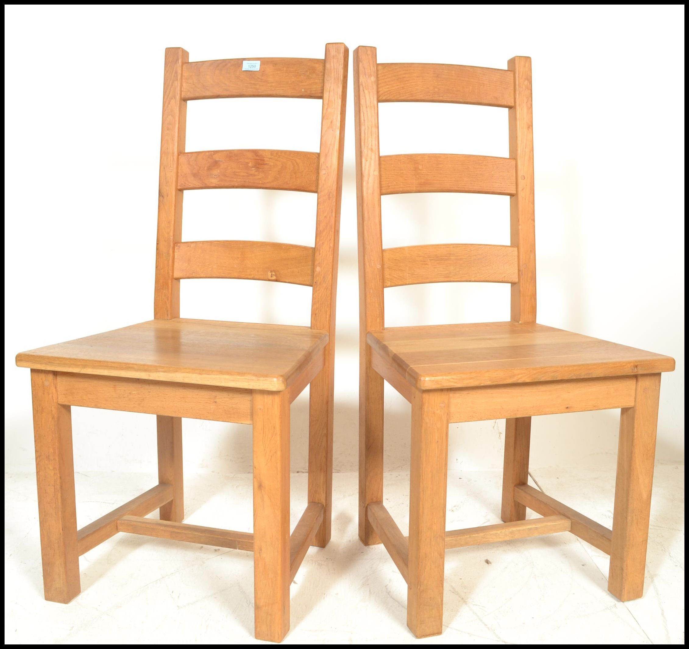 A set of good quality antique style solid oak country kitchen dining