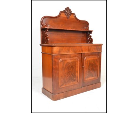 A good quality 20th century Antique Victorian style mahogany chiffonier sideboard. Raised on a plinth base with double door c