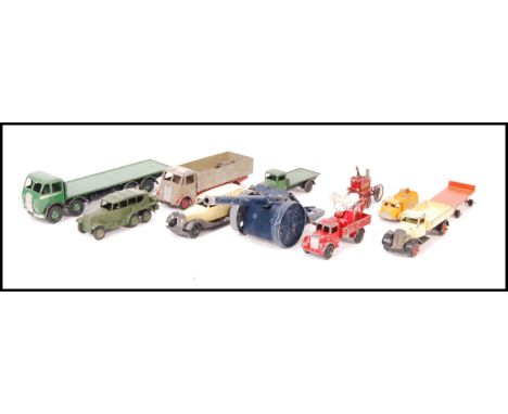 A collection of 11x assorted vintage early diecast model vehicles to include; Dinky ambulance, Britains artillery, DInky Supe