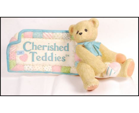 An original vintage Cherished Teddies shop advertising point of sale display featuring an oversized seated bear with double s