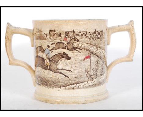 A 19th Century Victorian J. & R Godwin of Corbridge two-handled loving cup, transfer printed in brown with a horse race, thei