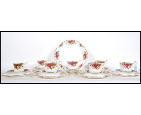 A Royal Albert Old Country Roses pattern tea service comprising of six cups, saucers and tea plates, cake plate and coffee cu