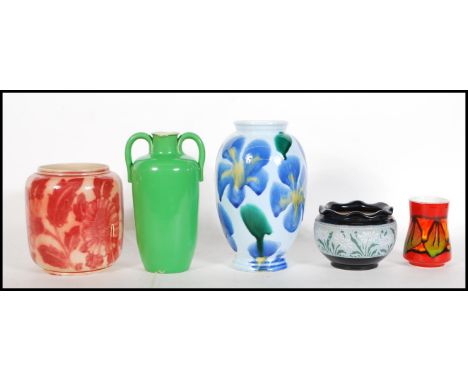A group of four vases dating from the 19th Century to include&nbsp;Lovatts Langley of bulbous form leadless glaze, decorative