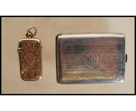 A silver hallmarked cheroot case having engine turned decoration to front and verso with central monogrammed cartouche. Hallm