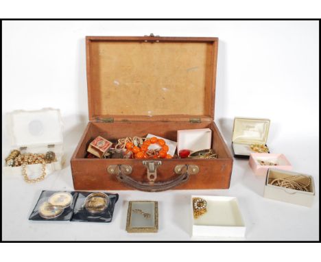 A collection of vintage costume jewelry to include necklaces one being tigers eye, silver rings, bracelets, brooches on being