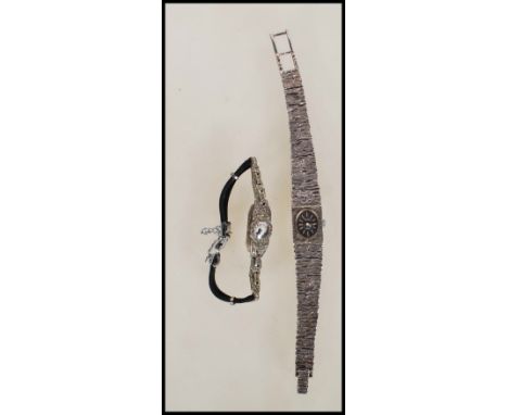 A 925 silver ladies Accurist wristwatch with bark effect tank face and strap, oval dial marked Accurist 21 Jewels. Together w