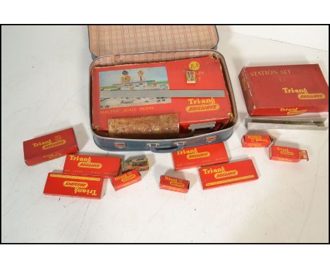 A collection of original vintage Tri-ang 00 gauge model railway train sets and spares to include a boxed RA train set appears