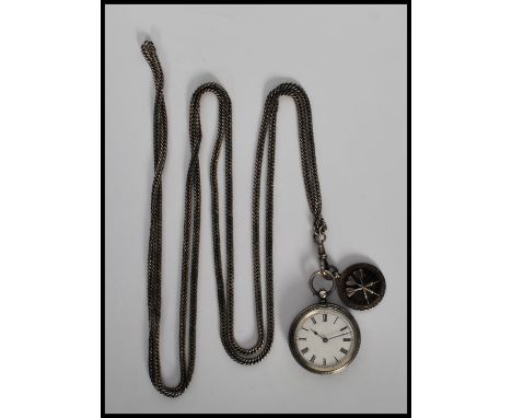 A silver open face pocket watch marked 800/1000 silver, having enamel face with Roman numerals to chaptel ring and silver Muf